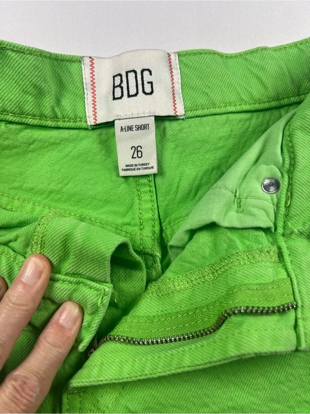 BDG Neon Green Distressed Denim Shorts